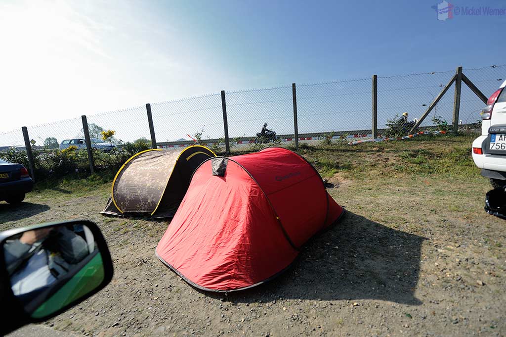 People camping alongside the roads to the Bugatti circuit in Le Mans