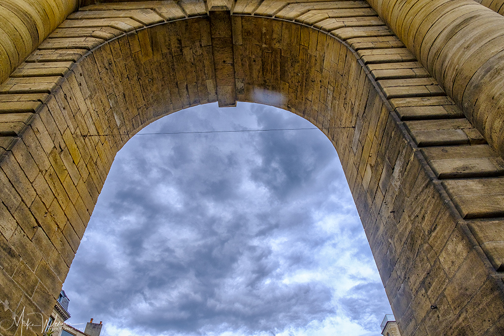 View to the top of the Porte de Bourgogne in Bordeaux