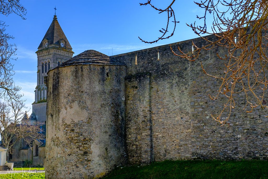 Saint-Philbert church seen next to the Noirmoutier castle Noirmoutier-en-l'Ile