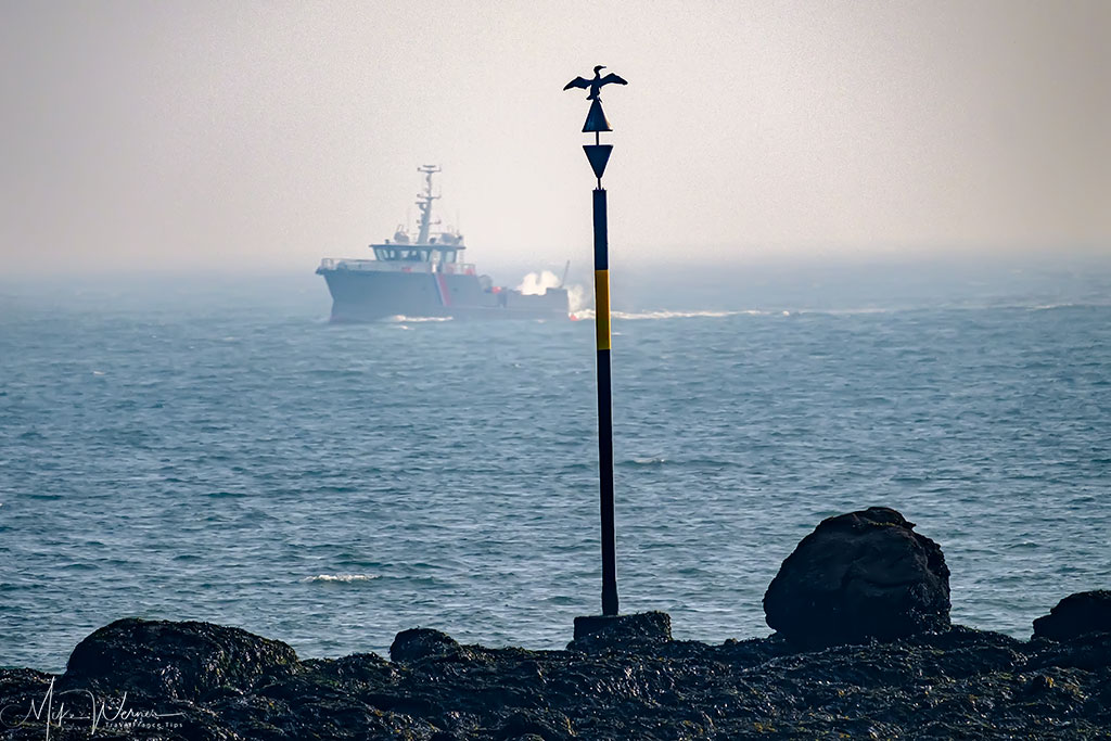 Lighthouse and buoy service boat at the South of Quiberon, Brittany