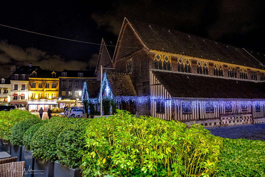 The mostly wooden nave of the Saint-Catherine church in Honfleur, Normandy at night