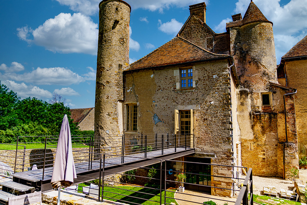 Aerial bridge over the old moat of the Balleure castle