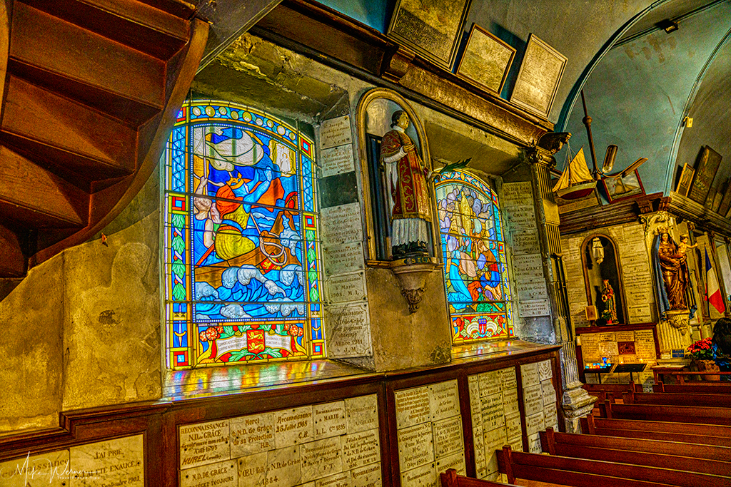 Stained glass windows everywhere in the Chapelle Notre-Dame de Grace