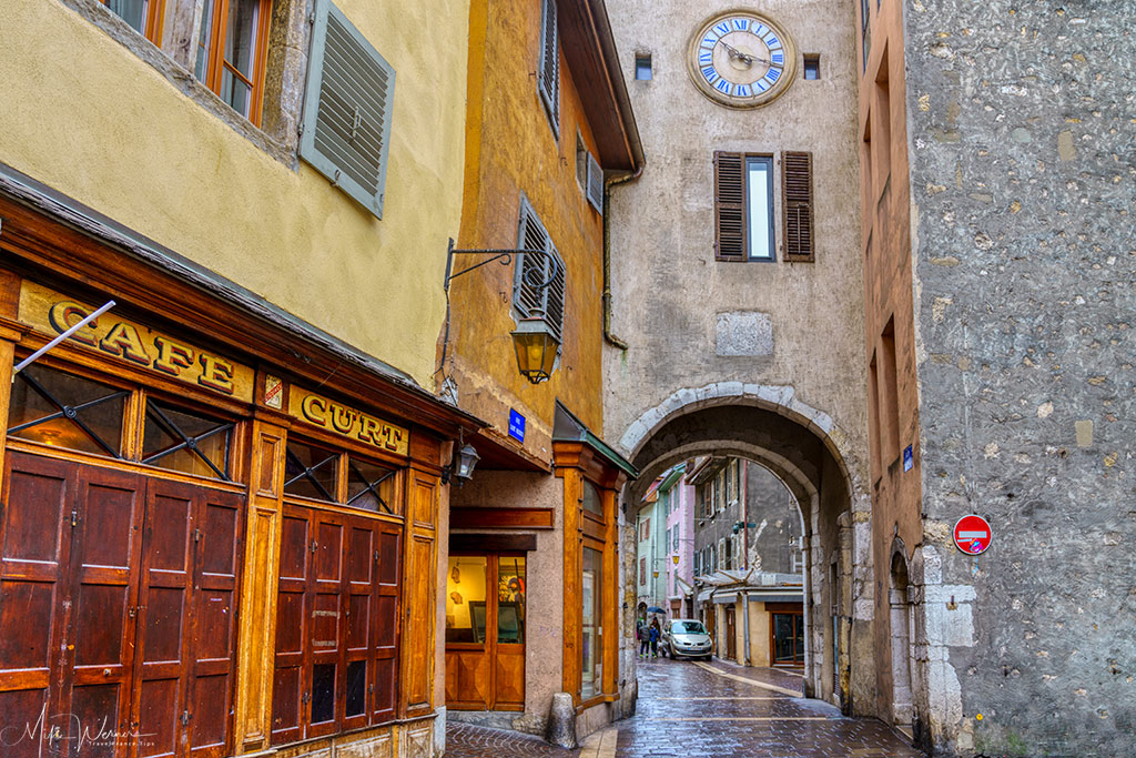 Passage through a building with a clock